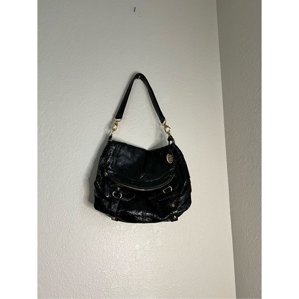 The Sak patent leather black‎ shoulder bag purse